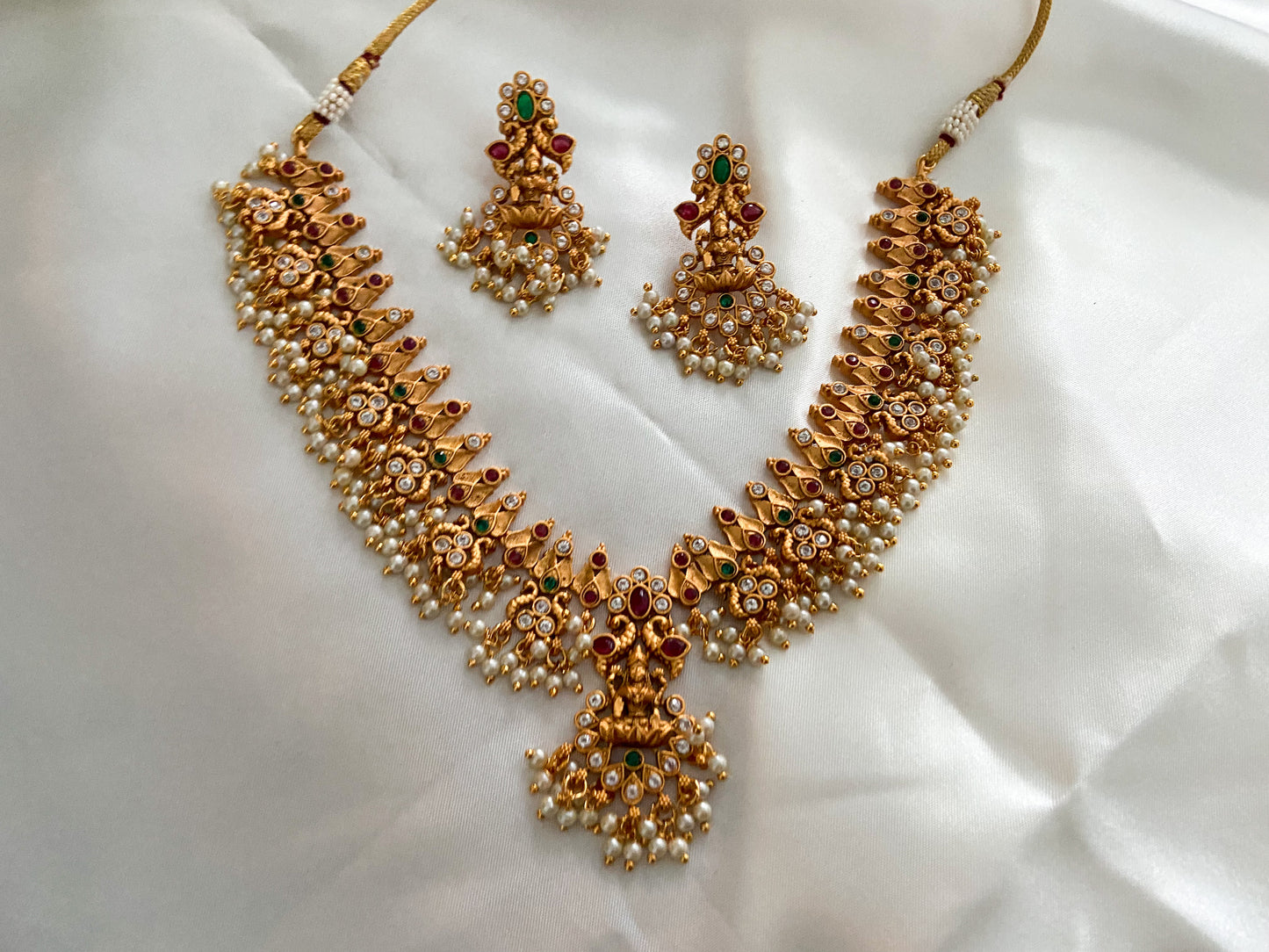 LAKSHMI RUBY GREEN PEARL NECKLACE SET